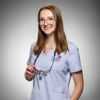 lek. dent. Justyna Woźniak - leczenie pod mikroskopem Warszawa Bielany